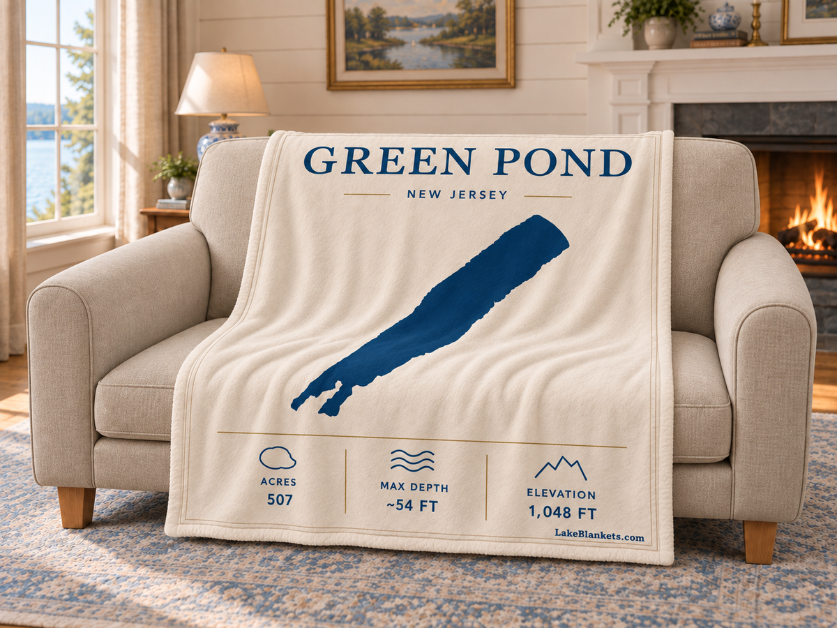Green Pond Minimalist blanket draped over a couch