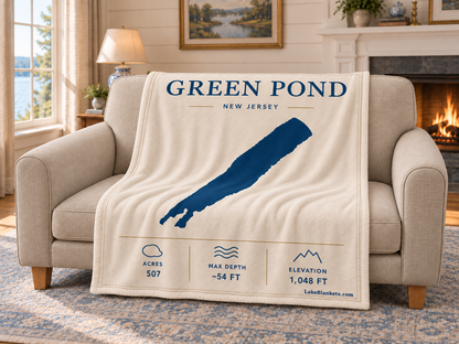 Green Pond Minimalist blanket draped over a couch