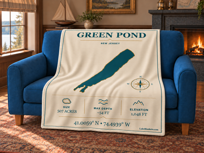 Green Pond Minimalist Navigation blanket draped over a couch