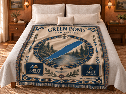 Green Pond Woven Landmark Medallion blanket displayed on a bed