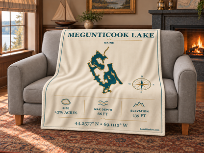 Megunticook Lake Minimalist Navigation blanket draped over a couch