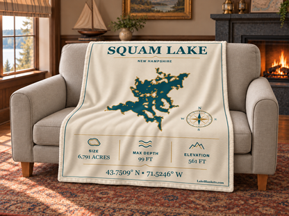 Squam Lake Minimalist Navigation blanket draped over a couch