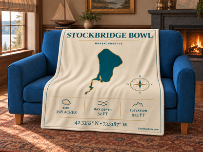 Stockbridge Bowl / Lake Mahkeenac Minimalist Navigation blanket draped over a couch