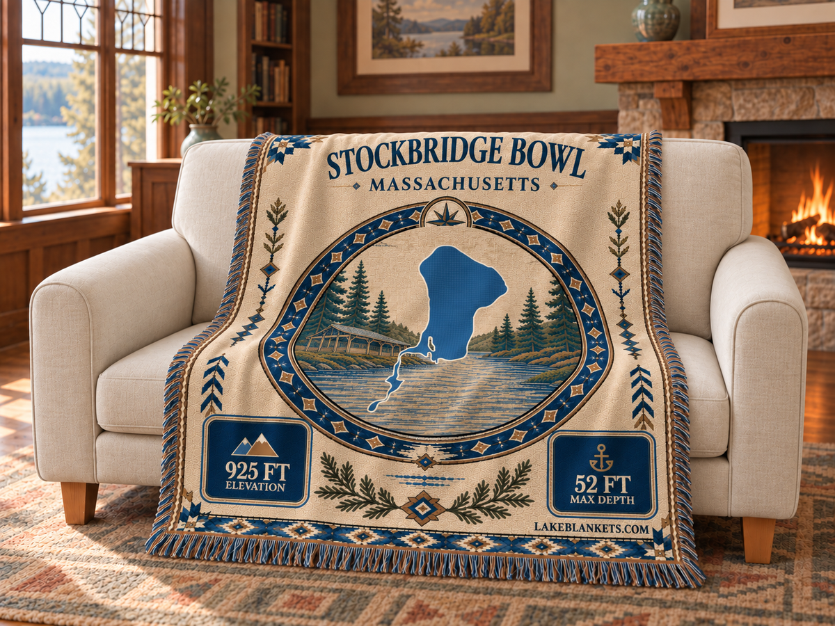 Stockbridge Bowl / Lake Mahkeenac Woven Landmark Medallion blanket draped over a couch