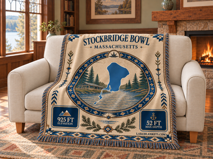 Stockbridge Bowl / Lake Mahkeenac Woven Landmark Medallion blanket draped over a couch